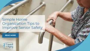 An elderly person grips a metal handrail in the bathroom for support, along with the blog title and a ‘Read More’ button.